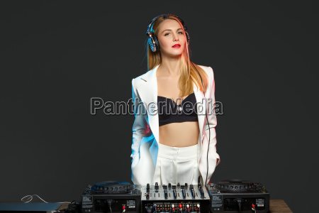 Beautiful blonde DJ girl on decks - the party - Stock Photo #14333321 |  PantherMedia Stock Agency