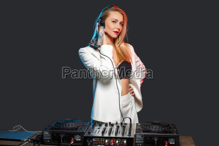Beautiful blonde DJ girl on decks - the party - Stock Photo #14333339 | PantherMedia Stock Agency Beautiful blonde DJ girl on decks - the party - Stock Photo #14333339 | PantherMedia Stock Agency