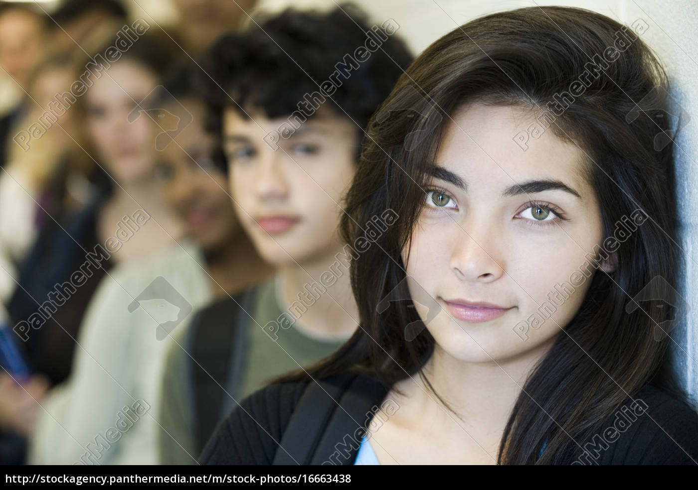 Stock Image 16663438 Teenage Girl Waiting At Front Of Line Portrait