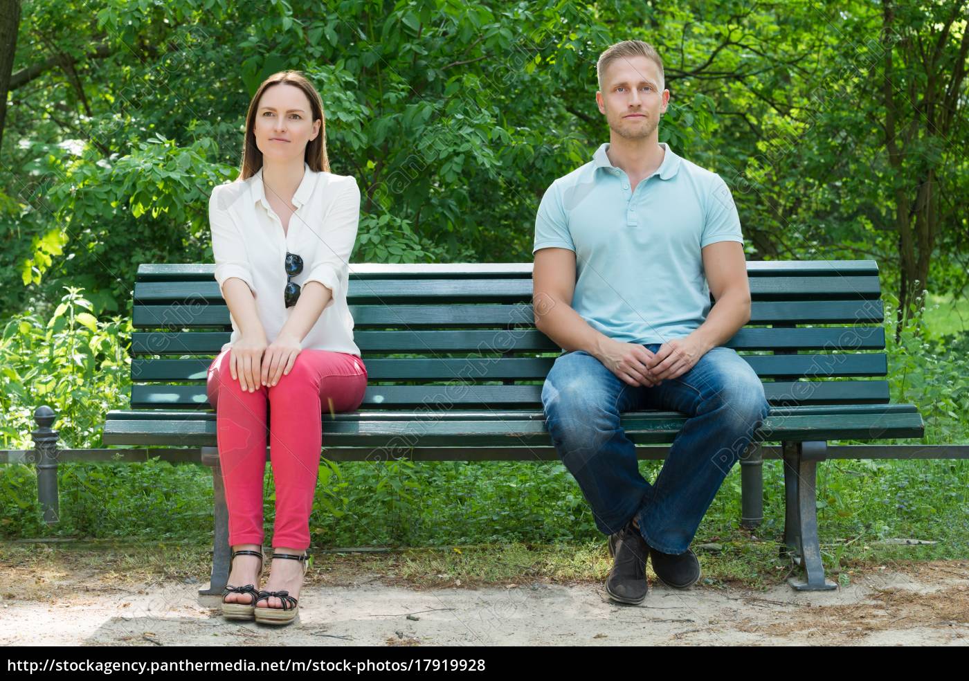 Shy Man And Woman Sitting On Bench Royalty Free Photo 17919928 Panthermedia Stock Agency