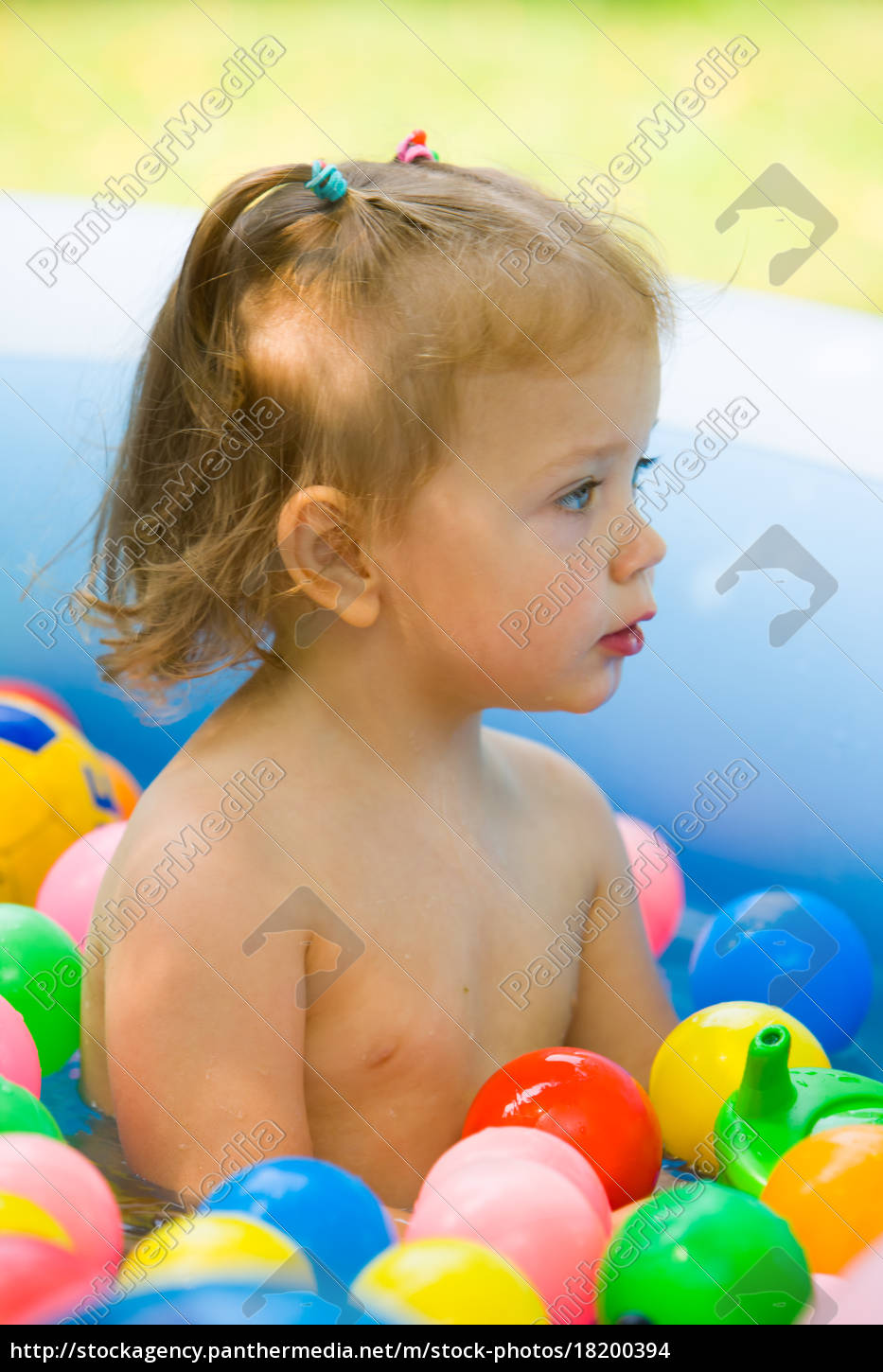 little baby playing with toys