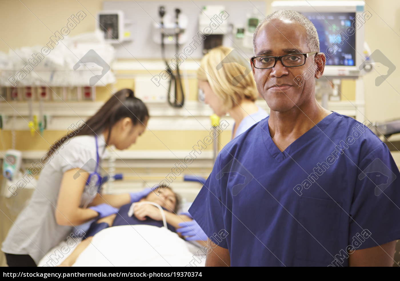 Stock Image 19370374 Portrait Of Male Nurse Working In Emergency Room