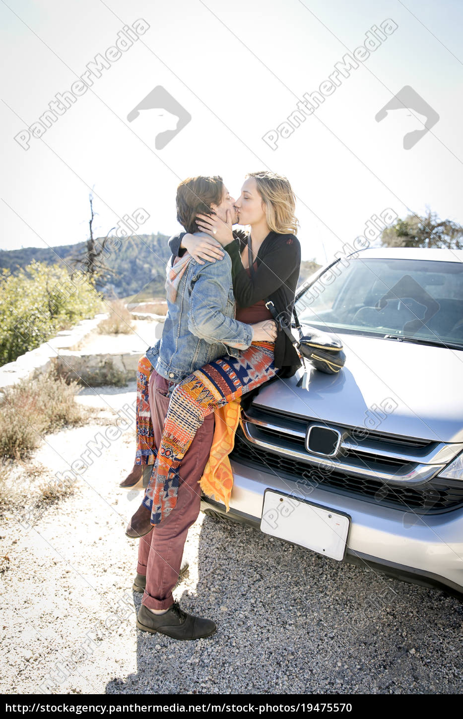 Young Couple Sitting On Bonnet Parked Stock Photo 215278807