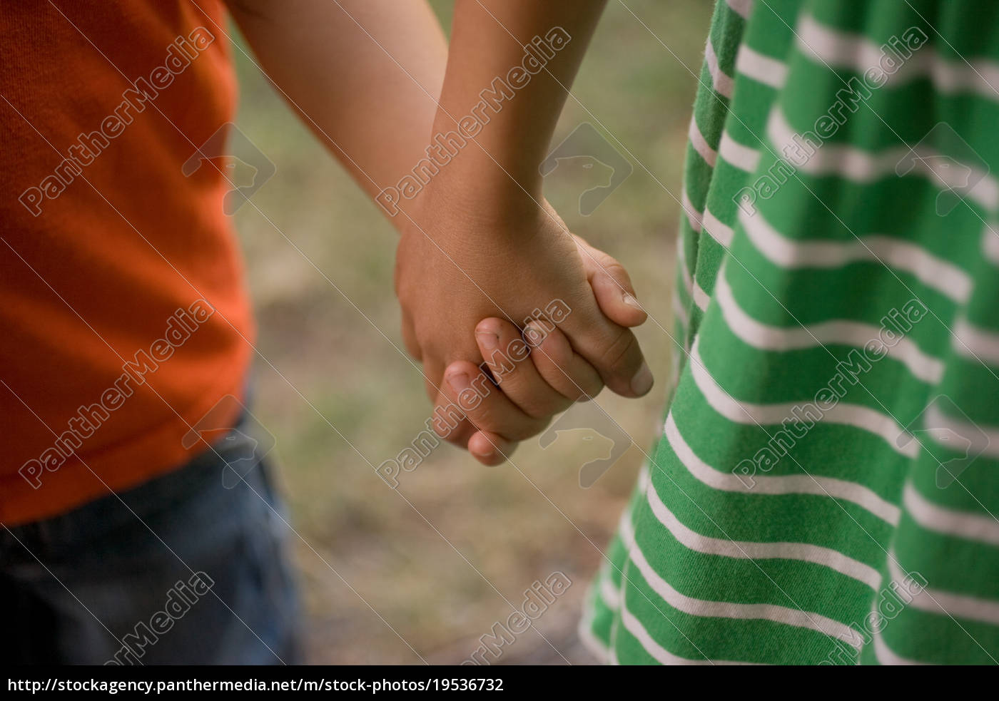 Girl And Boy Holding Hands Close Up Royalty Free Photo Panthermedia Stock Agency