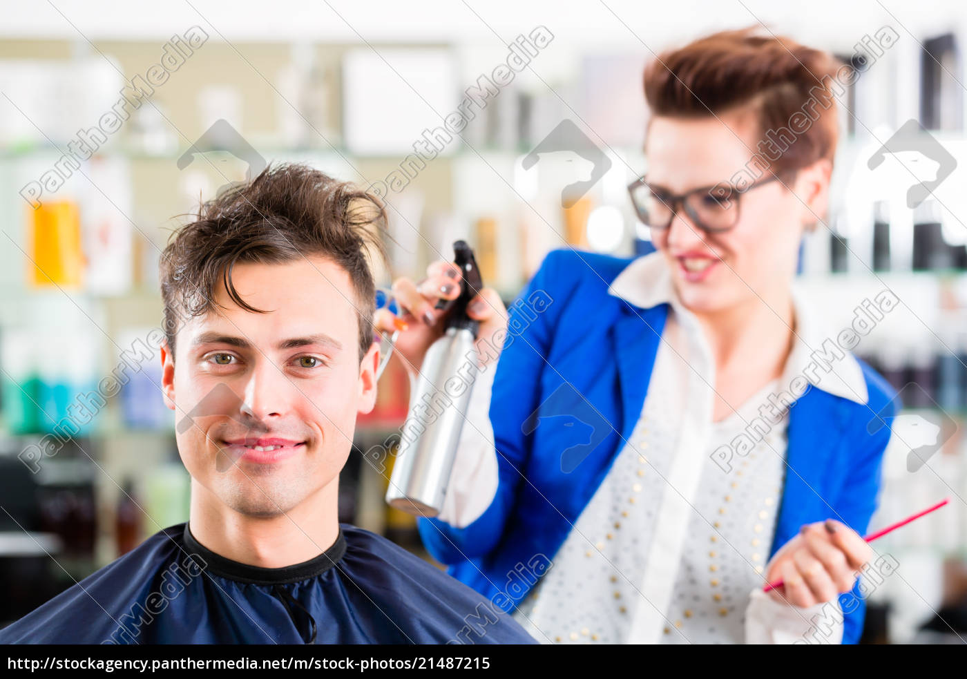 Hairdresser Cutting Man Hair In Barbershop Royalty Free Image