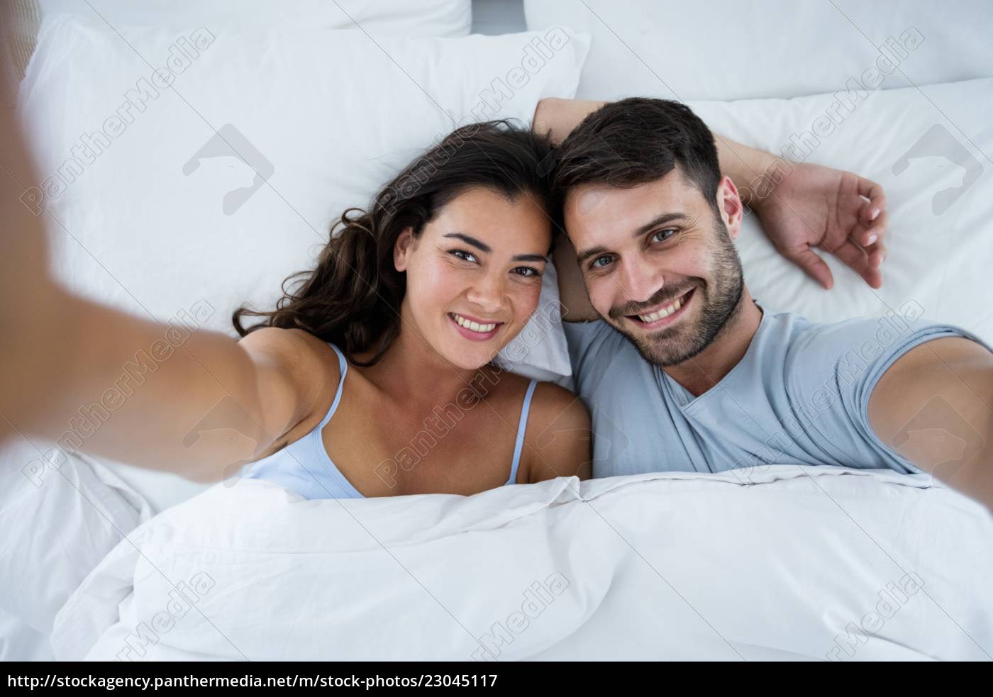 Stock Photo 23045117 Portrait Of Romantic Couple Sleeping On Bed