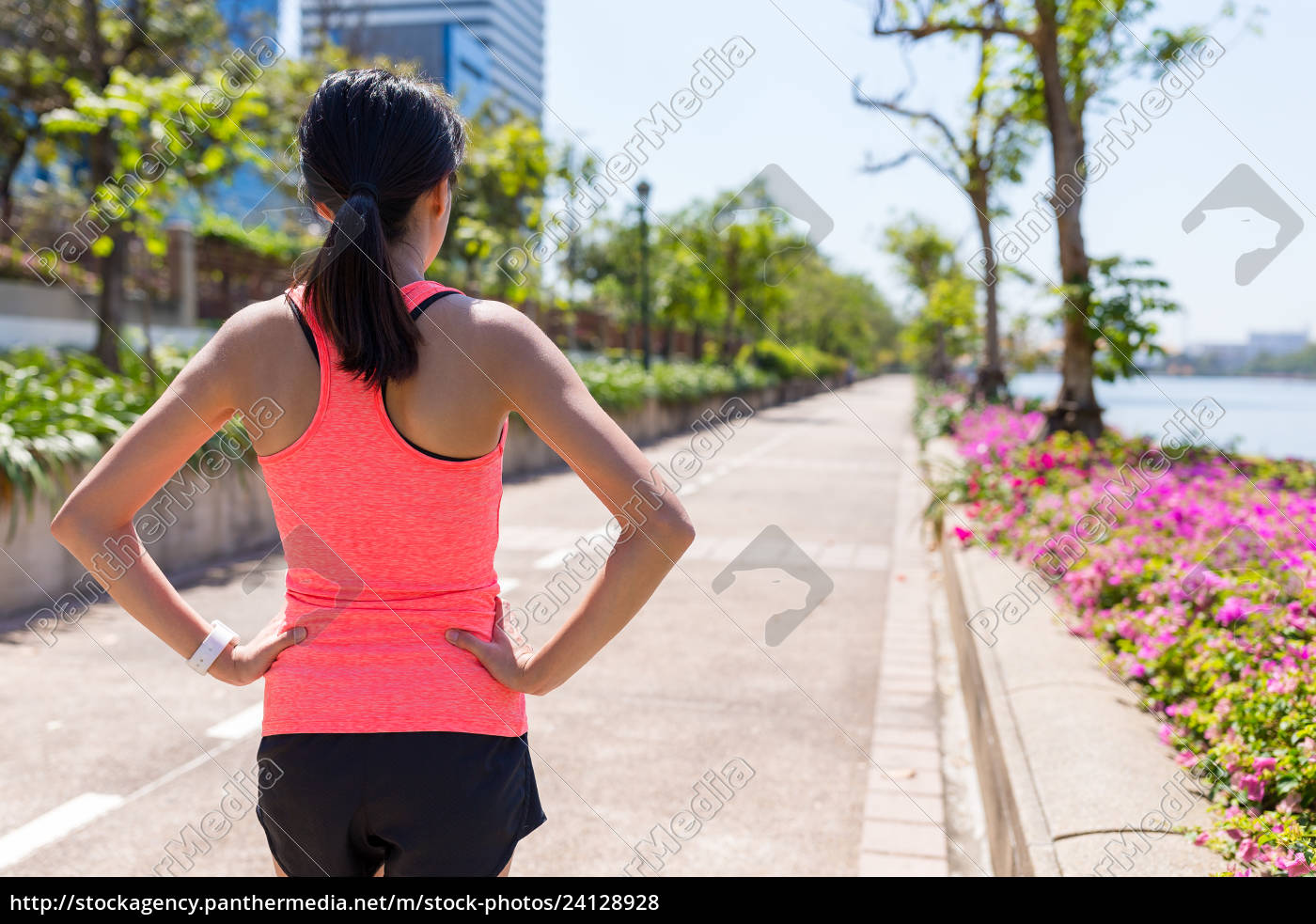 Download Back view of Sport woman running in the park - Royalty ...