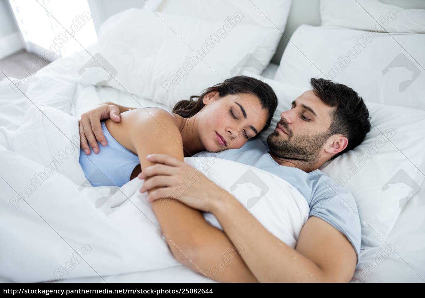 Royalty Free Photo 25082644 Young Romantic Couple Sleeping On Bed