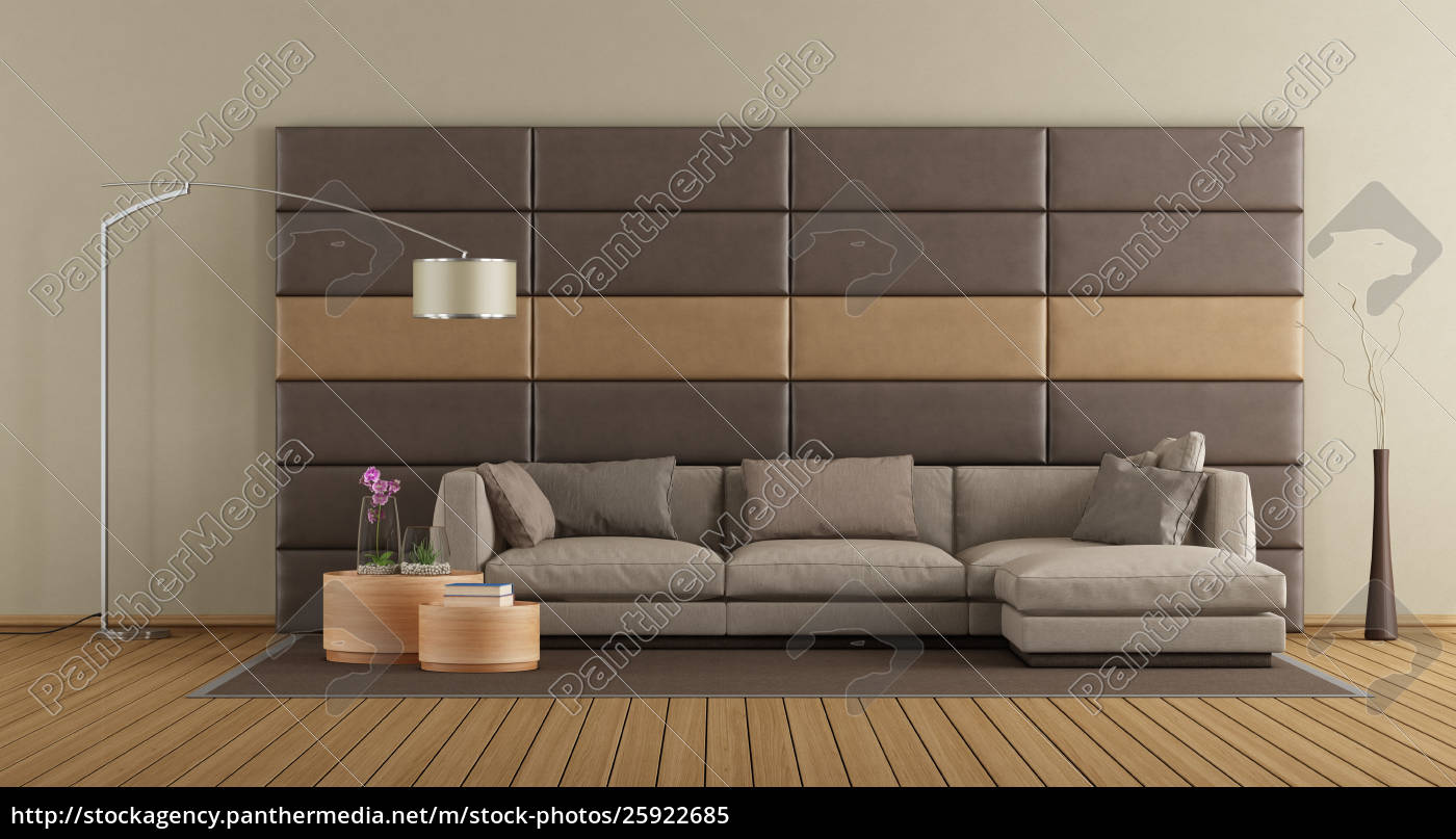 Brown Sofa Against Leather Panels Royalty Free Image Panthermedia Stock Agency