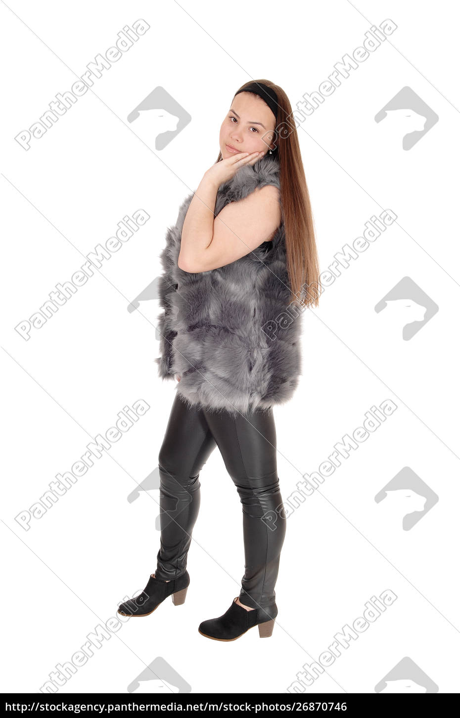Fotografia do Stock: Girl standing in black leather pants