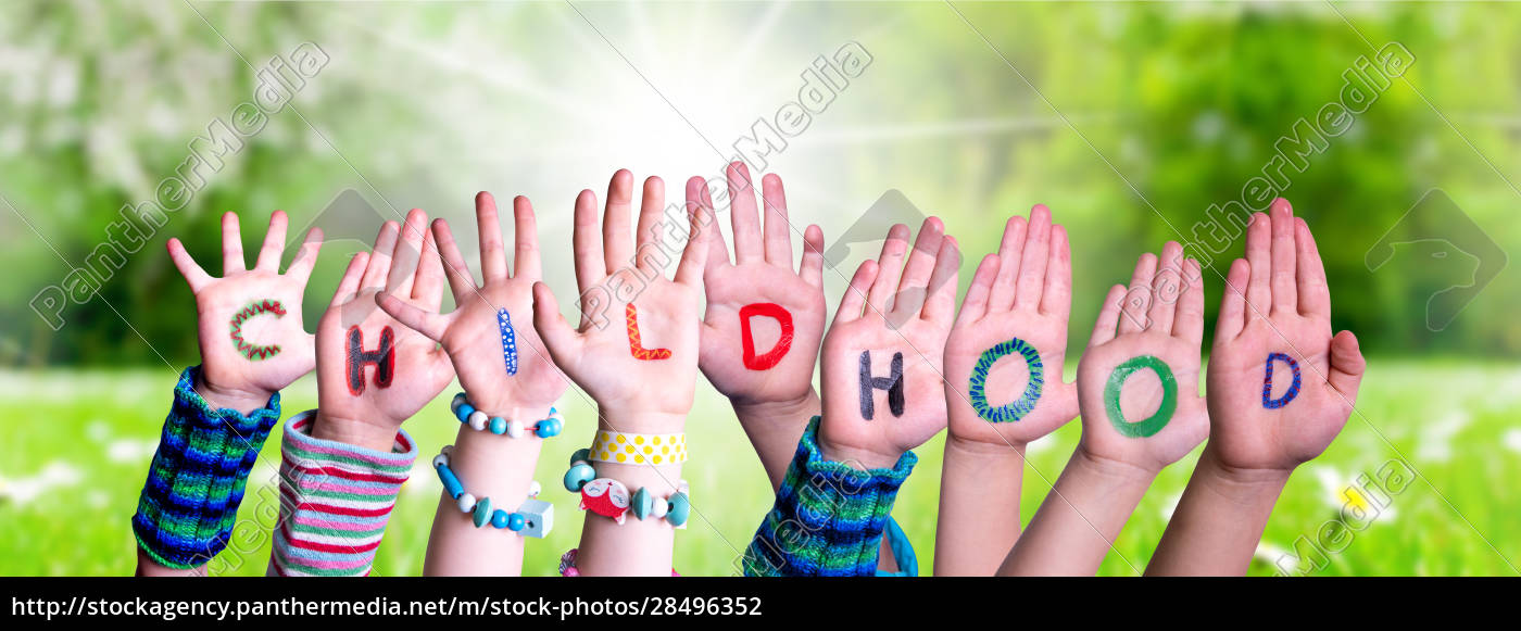 children-hands-building-word-childhood-grass-meadow-royalty-free